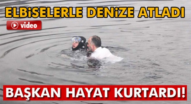 Denize atlayan belediye başkanı fenalaşan dalgıcı kurtardı